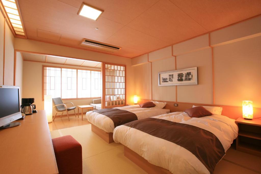 Hotel Taisetsu Onsen&Canyon Resort Камикава Стая снимка